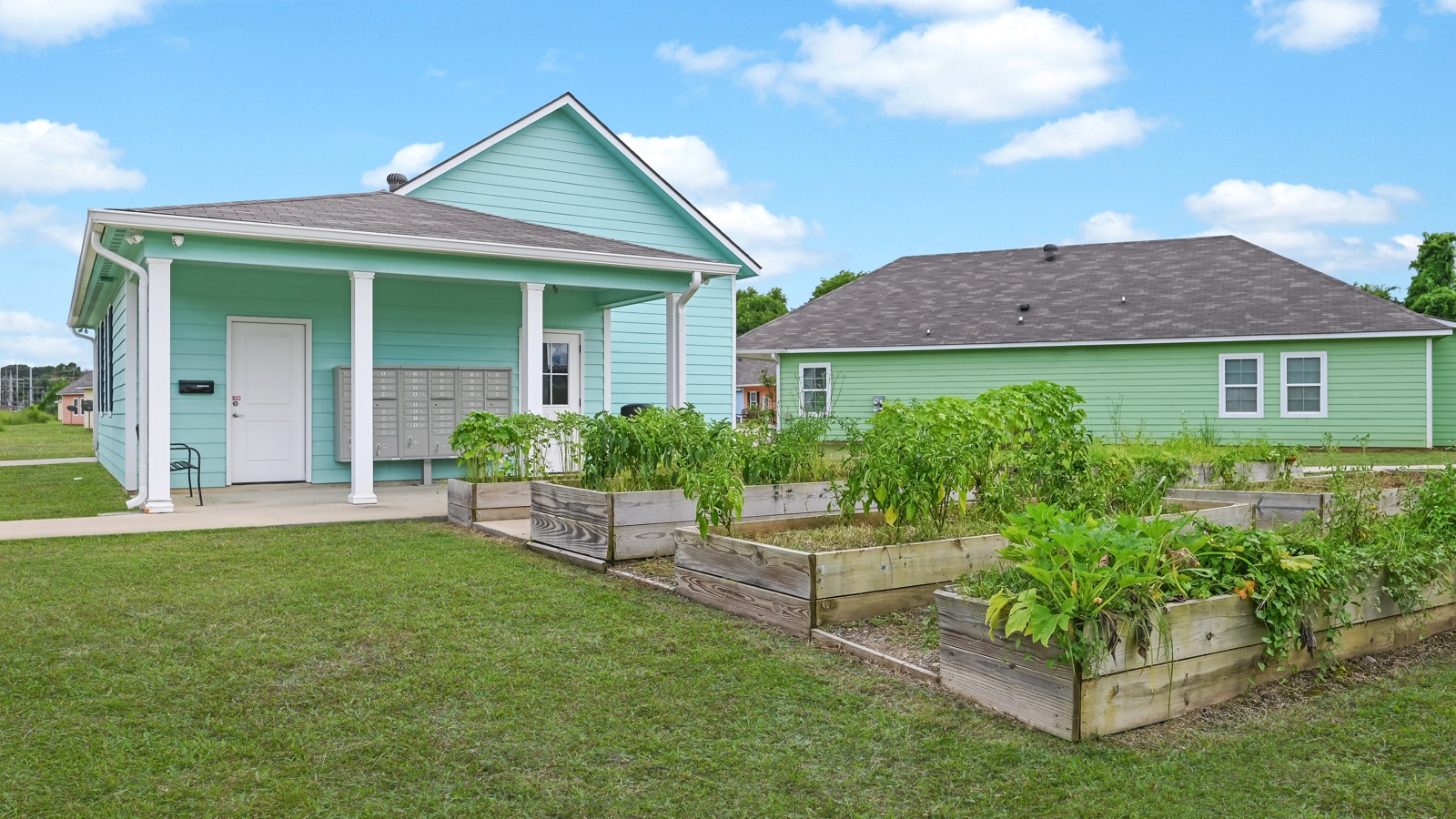 Bastrop Senior Living garden and community building